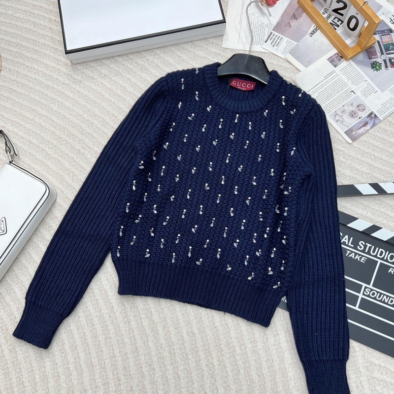 G*u*i sweaters